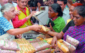Chief Minister Sheila Dikshit at a Mother Dairy booth in New Delhi on Saturday.