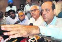 Chief Election Commissioner Naveen Chawla addresses mediapersons in Chandigarh on Saturday.