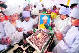 Children dress up as Sarvepalli Radhakrishnan, former President of India, to mark his birthday, which is celebrated as Teachers Day, in Ahmedabad on Saturday.
