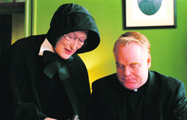 Meryl Streep as Sister Aloysius and Philip Seymour Hoffman as Father Flynn in Doubt