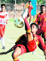 Players in action during a match at the Football Stadium in Chandigarh on Sunday.