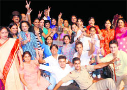 Members of Lotus House of KBDAV after winning the trophy during Guru Pratibha Day at Tagore Theatre in Chandigarh on Sunday.