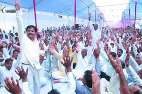 Congress MLA Jai Krishan along with members of the Balmiki Samaj during a ''Maha Panchyat'' on Dalit rights at Krishna Vihar, Sultan Puri in New Delhi