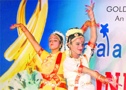 Girls perform a dance during a function to celebrate Onam in Ludhiana on Friday.