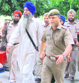 Daljit Singh Bittu, president, SAD Panch Pardhani, being produced at the District Courts in Ludhiana on Sunday.