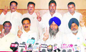 BSP General Secretary Man Singh Manhera and Harvinder Kalyan address a press conference after the latter joined the party in Karnal on Monday. 