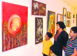 Visitors at a painting exhibition in Gurgaon.