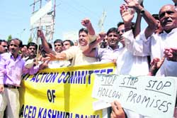 Members of the Joint Action Committee of Displaced Kashmiri Pandits protest at the Press Club in support of their demands in Jammu