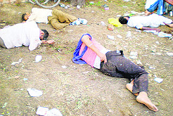 A bunch of drunk devotees pass out after consuming the prasad at Kaunke Kalan village in Jagraon. 
