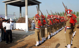 Cops giving gun salute to the departed soul.