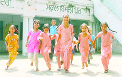 Girls enjoy a happy moment at the Government Primary School of Bijlipur village.