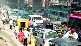 Traffic chaos near the bus stand due to the construction of elevated road in Amritsar are a regular feature