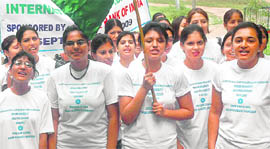Students take part in a rally to mark the International Literacy Day at Panjab University in Chandigarh on Tuesday.