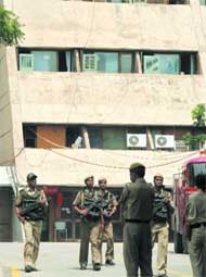 Cops guard Palika Kendra building.