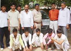 Members of a gang that robbed a petrol pump arrested by the special staff of the police at Sector 17 in Gurgaon.