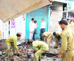 An anti-encroachment drive in Dharamsala.