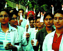 Junior doctors take out a candlelight march in protest against the state governments delay in the notification of higher pay scales in Amritsar.