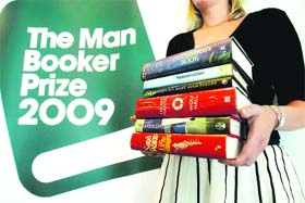 The six shortlisted novels for the Man Booker Prize 2009 are seen at the end of a news conference to announce the finalists in London