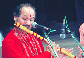  Flautist Mazumdar giving a performance at the Gaiety Theatre in Shimla. 