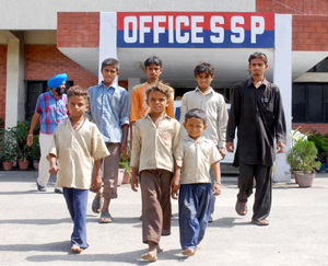 Mohammad Rafi and his brothers come out of the office of the SSP after lodging their complaint seeking rescue of their mother, in Jalandhar.