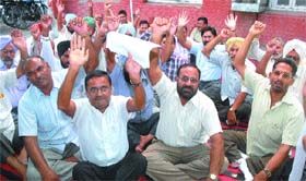 Members of the Food and Supplies Inspectors Union hold a protest in Jalandhar