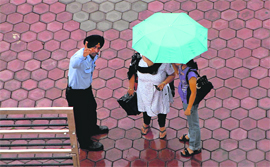 A cop comes to the rescue of these two damsels in distress.