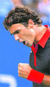 Roger Federer celebrates a point against Robin Soderling on Wednesday.