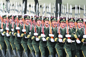 Chinese soldiers take part in a welcome ceremony for Central African Republics President Francois Bozize outside the Great Hall of the People in Beijing on Thursday.