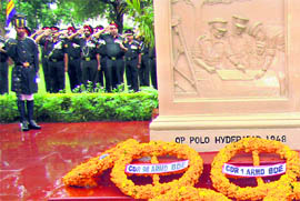 Army officers salute the martyrs of the 1965 war at War Mamorial in Patiala on Friday.