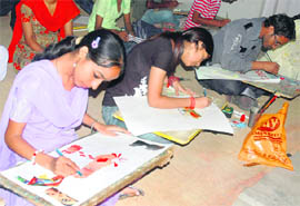 Students participate in a painting competition on the inaugural day of Human Development Festival at Government Mahindra College in Patiala on Friday.