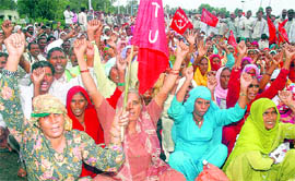 Employees of the forest department hold a protest.