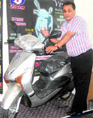 Rajeev Sachar, MD, Doon Scooter India, launches e-Scooter in Dehradun on Thursday.