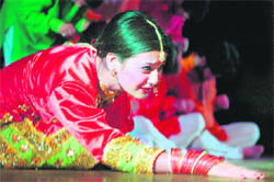 An artiste enacts a scene from Dogri play Ghumahee at Abhinav Theatre in Jammu.