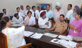 Gurmeet Kaur, civil judge (senior division), makes a point during a Lok Adalat organised in Jalandhar on Saturday.