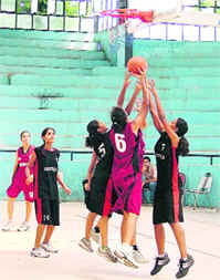 Ludhiana and Kapurthala district girls in action on the penultimate day of the 60th Junior Punjab Bassketball Championship at Guru Nanak Stadium of Ludhiana on Saturday.