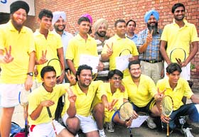 Winners of the Panjab University Inter-College Ball Badminton Championship in a joyous mood in Chandigarh