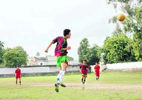 Players in action at the Dehradun Football League in Dehradun