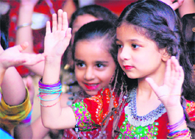 Kids participate at a Dandiya Disco party in the Strawberry Kids Club in Ludhiana
