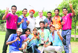 Players after winning the softball tournament in Ludhiana on Sunday. 