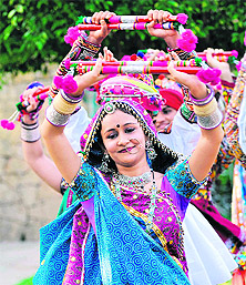 Members of dance group Panghat perform garba during a rehearsal for the forthcoming Navratri festival in Ahmedabad on Sunday. 
