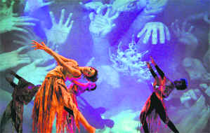 Members of international dance group Sandhya perform on the theme of global warming during a show in Ahmedabad on Saturday.