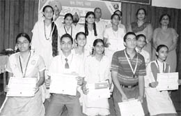 Students with their prizes during Hindi Diwas celebrations at the language department in Patiala on Monday. 