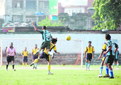 A match of Dehradun Football League in progress. 