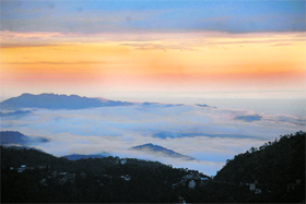 A view of Tara Devi hills during a drizzle near Shimla. 
