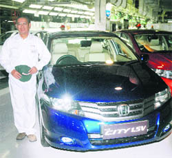 Masahiro Takedagawa, president and CEO, Honda Siel Cars India, at the launch of Honda City 1.5V and new Honda City 1.5S in Greater Noida on Tuesday.