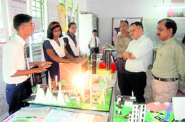 Students explain their models to visitors at a science exhibition at Kendriya Vidyalaya, ONGC, Dehradun, on Tuesday.