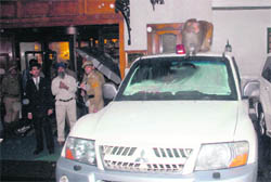 Perched atop a red light-fitted VIP vehicle, this monkey seems to enjoy all the attention from onlookers in Shimla.