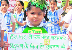 Awareness rally by students of Ashimah International, Sector 70, in Mohali on Wednesday.