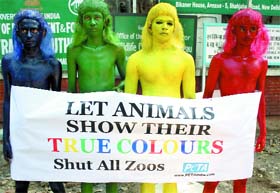 PETA activists protest in front of the Central Zoo Authority office in New Delhi