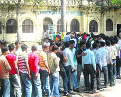 Students line up to vote for the student council at DAV College in Dehradun on Wednesday.